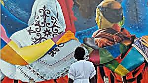 Artistes peignant une fresque à Cotonou